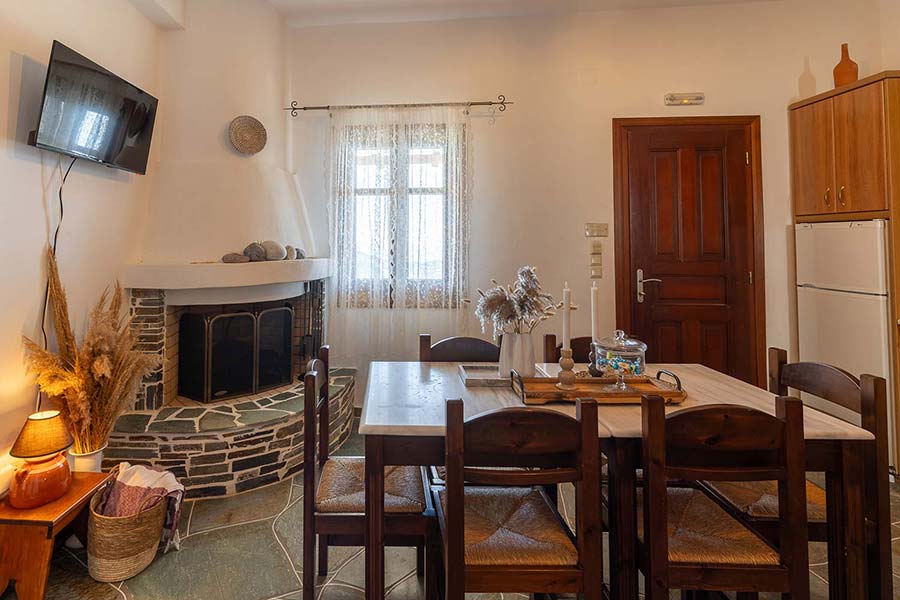 The living room and dining table in the Bougainvillea apartment